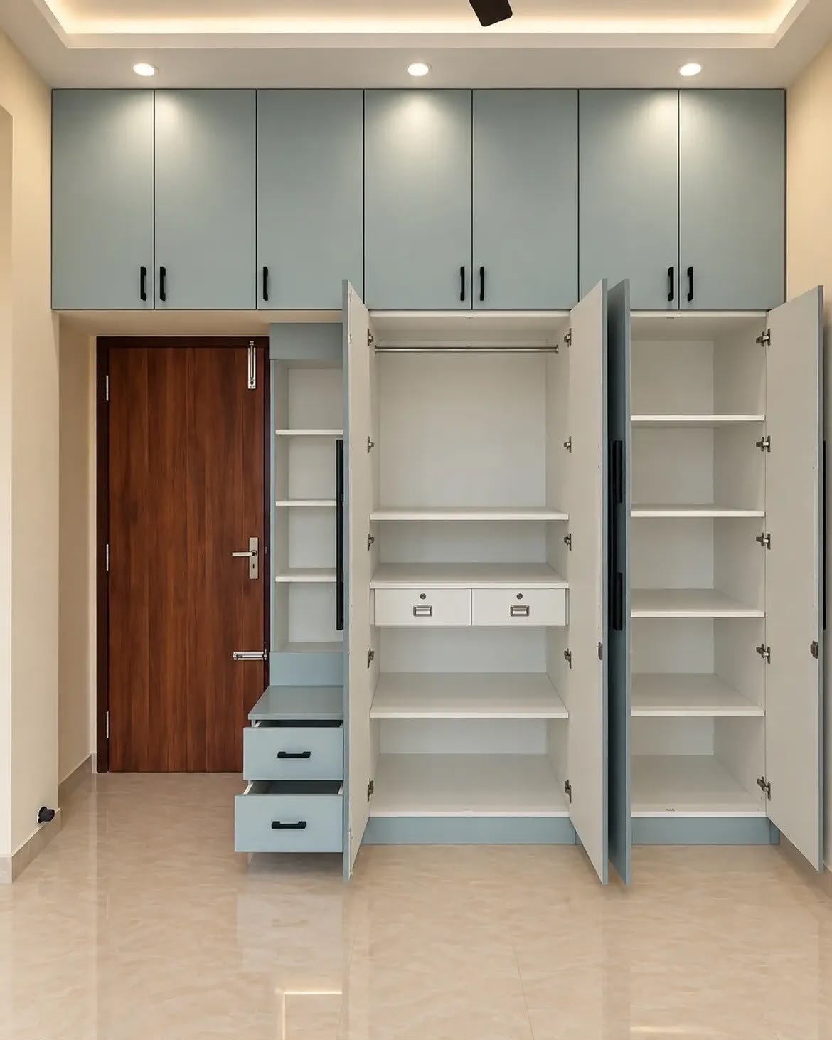 Blue wardrobe with mirror and lighting